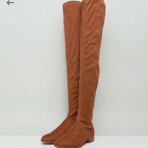 Over the knee flat boot